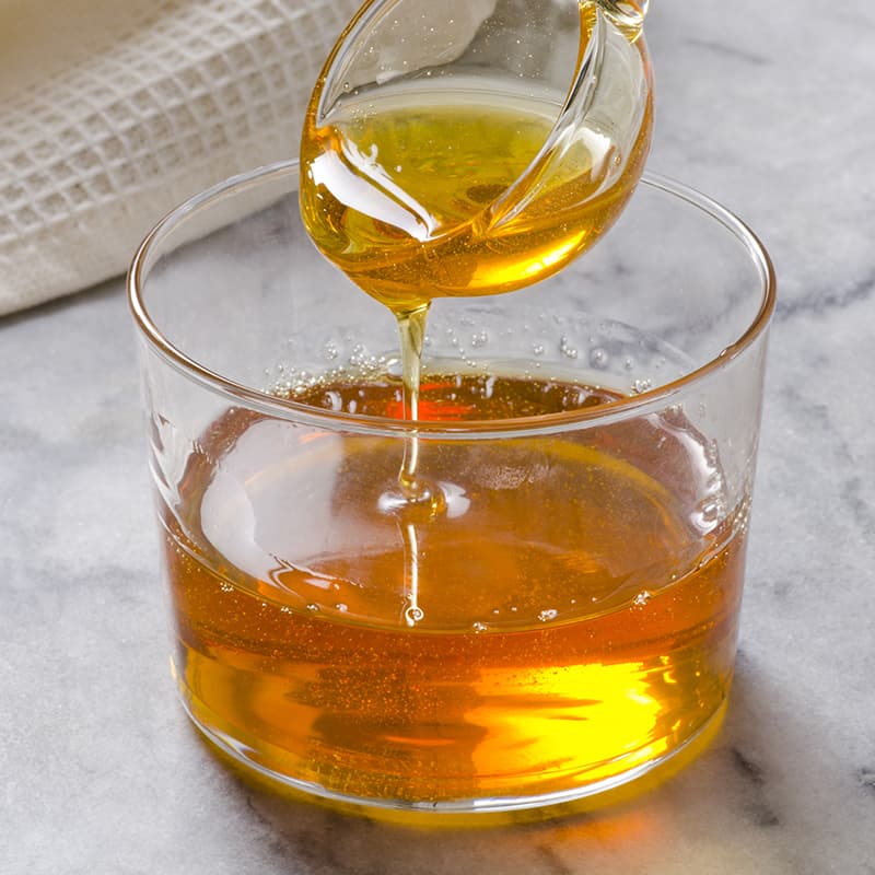 https://www.honeysource.com/wp-content/uploads/2021/05/pour-honey-jar.jpg