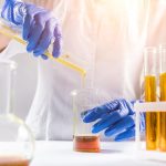 Scientist in laboratory testing honey